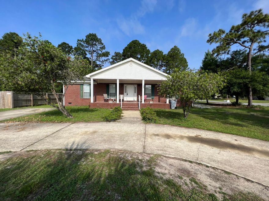 Half Acre Corner lot with no HOA close to military bases and the beach! 3 Bed 2 bath split floor plan home with a large living room and a fireplace for them cold nights. New roof to be installed before closing, newer water heater, newer HVAC, on septic but city sewer is available. There is plenty of room for parking boats, RV's, or ATV's on the finish circular driveway! Have fun entertaining on the large wood deck out back. The covered patio on the front is spacious and perfect for drinking your coffee and relaxing. The house does needs some TLC.