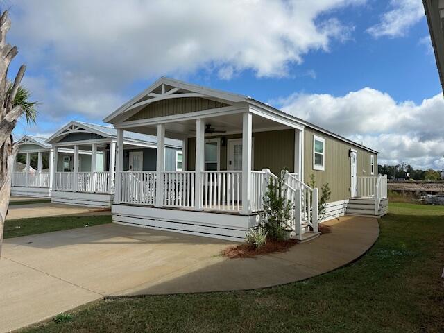 Riverwalk Landing is a 55+ Resort Community in Freeport, FL. This cute cottage is a 2 bedroom, 1 bath fully furnished including a washer and dryer. Renting this cute cottage allows you to use all of the resorts amenities of Riverwalk Landing: Community Pool, outdoor gas grills, Community Clubhouse with full kitchen, game room, social/party room, exercise room, showers/changing rooms, and card room, also enjoy a Fire Pit, two Pickleball Courts,  and Small and Large Dog Parks.  There are loads of activities for you to enjoy.  If you are 55+, give me a call for your private showing.