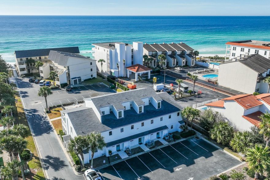 Exceptional home in the heart of Seagrove. Located approx a mile east of Seaside this second tier townhouse has decent gulf views and you actually own the land! The large open living & kitchen area offers a wet bar, a fireplace, and plenty of storage. Off the living area is a large covered deck to smell the salt air and hear the waves. With two bedrooms, a large bonus room, two and 1/2 baths, two large exterior storage rooms, two assigned parking spaces plus overflow parking, all located close to all the best restaurants & amenities 30A has to offer. Items to note: new roof and cement siding 2020, new AC 2022, and new impact French doors 2019.Dimensions,descriptions, and other details deemed correct: buyer to verify. At the sole discretion of the seller an offer may be accepted at anytime
