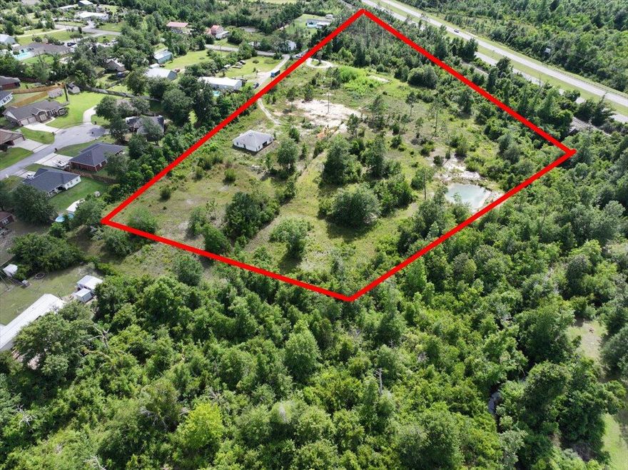 Just Over 9 Acres -- Prime Development Opportunity or Private Mini Farm. Tucked away at the end of a quiet dead-end road, this 9+ acre property offers incredible potential. With over half of the land already cleared, it's ready for your vision--whether you're an investor, developer, or looking to create a custom homesite or mini ranch. Zoned Multi-Family with access to water and sewer. According to the zoning, the property allows for up to 10 units per acre (verify with local zoning). Conveniently located near Highway 231 and Star Avenue, you're just minutes from shopping, schools, and fishing spots--making this an ideal location for a residential development or income-producing investment. A home already sits on the property, and would make for a great fixer upper project. Don't miss this rare opportunity to own a versatile piece of land in a growing area with strong future value.
