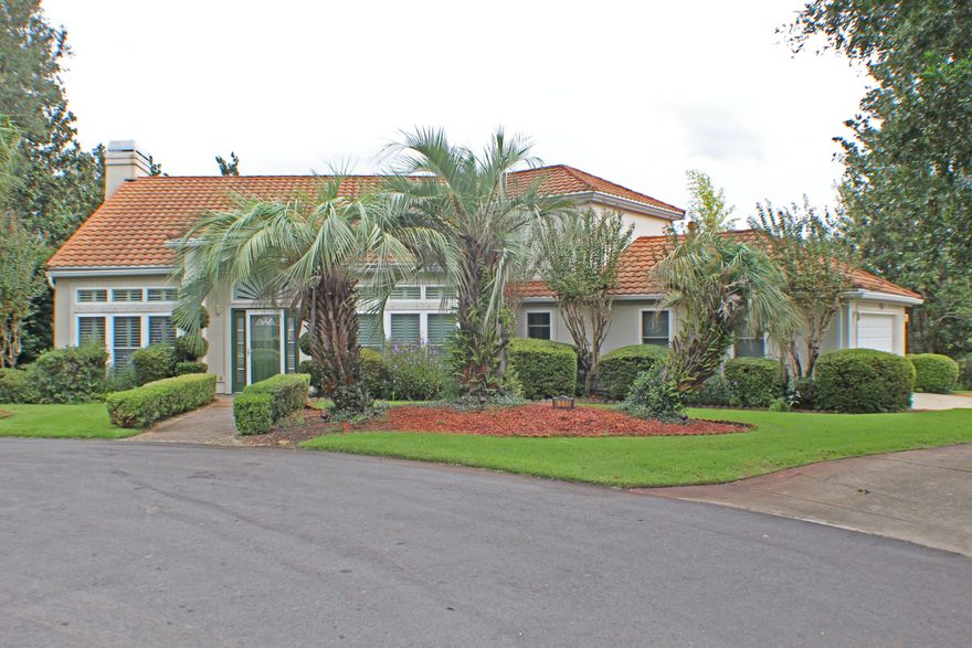 Gorgeous, Gary Miller 1991 Parade of Homes winner in the heavily sought-after gated community of Parkwood Estates on a quiet cul-de-sac with views of the Bayou and many upgrades within the last four years. Just to mention a few of the recent upgrades: Metro Tile Roof 2012, Retaining wall along the creek, all windows replaced 2012, Murphy bed in spare bedroom, irrigation system with pump 2016, hurricane garage door 2013, new carpeting. Let's take a tour: As you enter this home, the grand staircase invites you in. To your left is a living room with vaulted ceiling. Through the pocket doors is a family room complete with a fireplace, sliding glass door opening up to your patio, and the kitchen. Granite counter tops, plenty of cabinet space, a five-burner gas stove, desk area