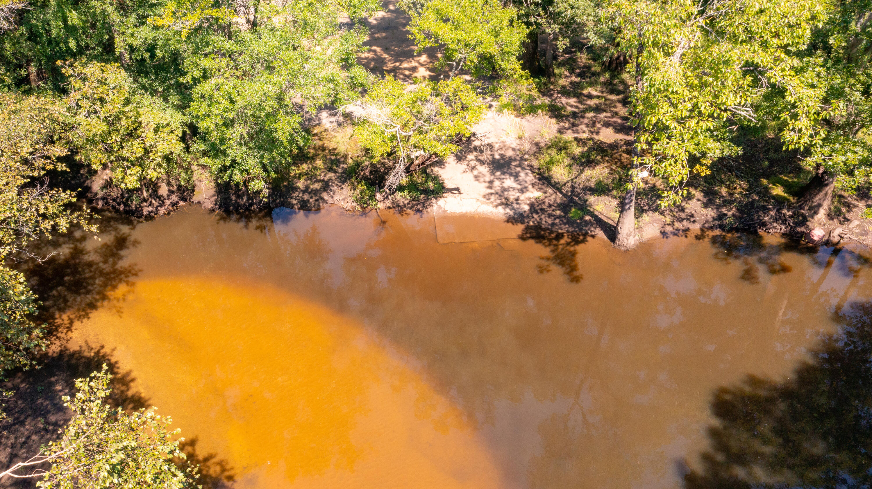 This awesome 2.49 acre parcel is located in the riverfront community of Inlet Retreat. The property is fully fenced and already has power and water on site, making it an ideal setting for a future homesite or a private weekend retreat.The gated community features a private boat ramp, a covered picnic area, and direct access to Yellow River Water Management Area, offering endless opportunities for outdoor recreation.This property is ready for your vision. Schedule your showing today.