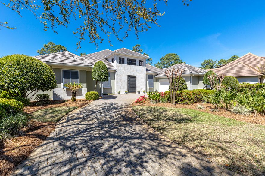 PRICE REDUCE! Seller is found another home.   Nestled in the heart of Sandestin Golf & Beach Resort's esteemed Island Green. This home stands as a masterpiece of contemporary elegance, offering a coveted lakefront position with breathtaking views over the 5th hole of the Raven golf course.Upon entering, the home unfolds into a grand lanai, the epicenter of outdoor living, featuring a heated pool and hot tub, perfectly crafted for both serene relaxation and lavish entertaining. Unique to this property is a private carriage house, complete with a spacious bedroom, bath, morning kitchen, and its own garage. New Washer/Dryer, Wine Cooler, 4 New TV's,  2 New Dishwashers, New pool Heater/Filter, 3 Newer HVACs.  New Gas Stove Top ,New Refrigerator/guest house. New Sound System.