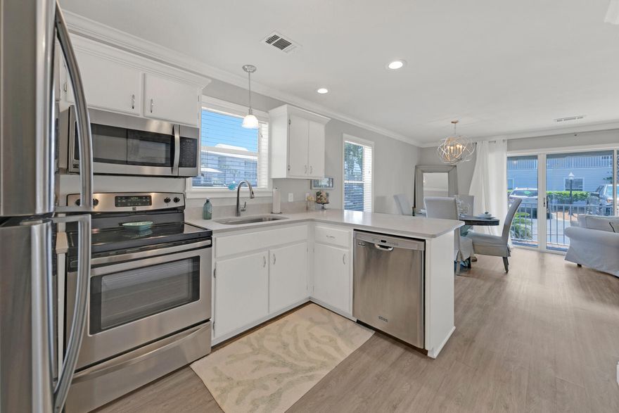 $14,000 assessment paid in full! Just steps from the beach. Completely remodeled and turn key ready - just in time for summer! This spacious and stunning unit features both modern amenities and architectural character in a fantastic 30A beach community. The Chef's size kitchen boasts gorgeous Marabella white quartz countertops w/ a 5 inch backsplash, stainless steel appliances and storybook white cabinetry. Complete with upscale designer decor and custom made furniture. Take sight of the 5 1/2 in. baseboards and custom crown molding, and beautiful dark LVP flooring throughout - NO CARPET! Just steps from beaches, pools, lakes, pickle ball, live entertainment, music, shopping, world famous restaurants, and plenty of areas to explore in 30A's Seaside, Rosemary Beach and Seacrest Beach!