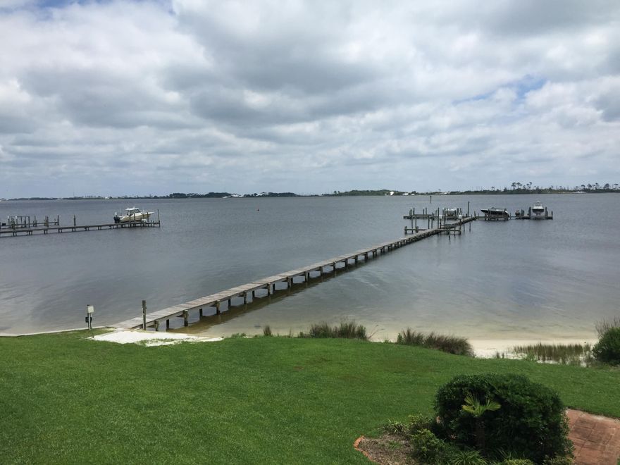 Spectacular views! Own this lovely Sound front condo in Mary Esther just minutes from Hurlburt Field and very close to Eglin. This unit is practically brand new as seller has updated virtually everything. All new doors and windows rated at 140 MPH, new HVAC and air handler last year, new appliances: washer/dryer, dishwasher, oven, microwave, new granite countertop in kitchen, new plumbing, new interior doors & hardware, new cabinets, new sinks (and faucets) and new marble vanities in both baths, new carpet & wood-look flooring, freshly painted. Hurricane shutters. Being sold unfurnished. Storage shed 4 conveys. Plenty of boat slips available to rent from association for just $150 per year. Association carries flood/ wind insurance. Owner financing available.