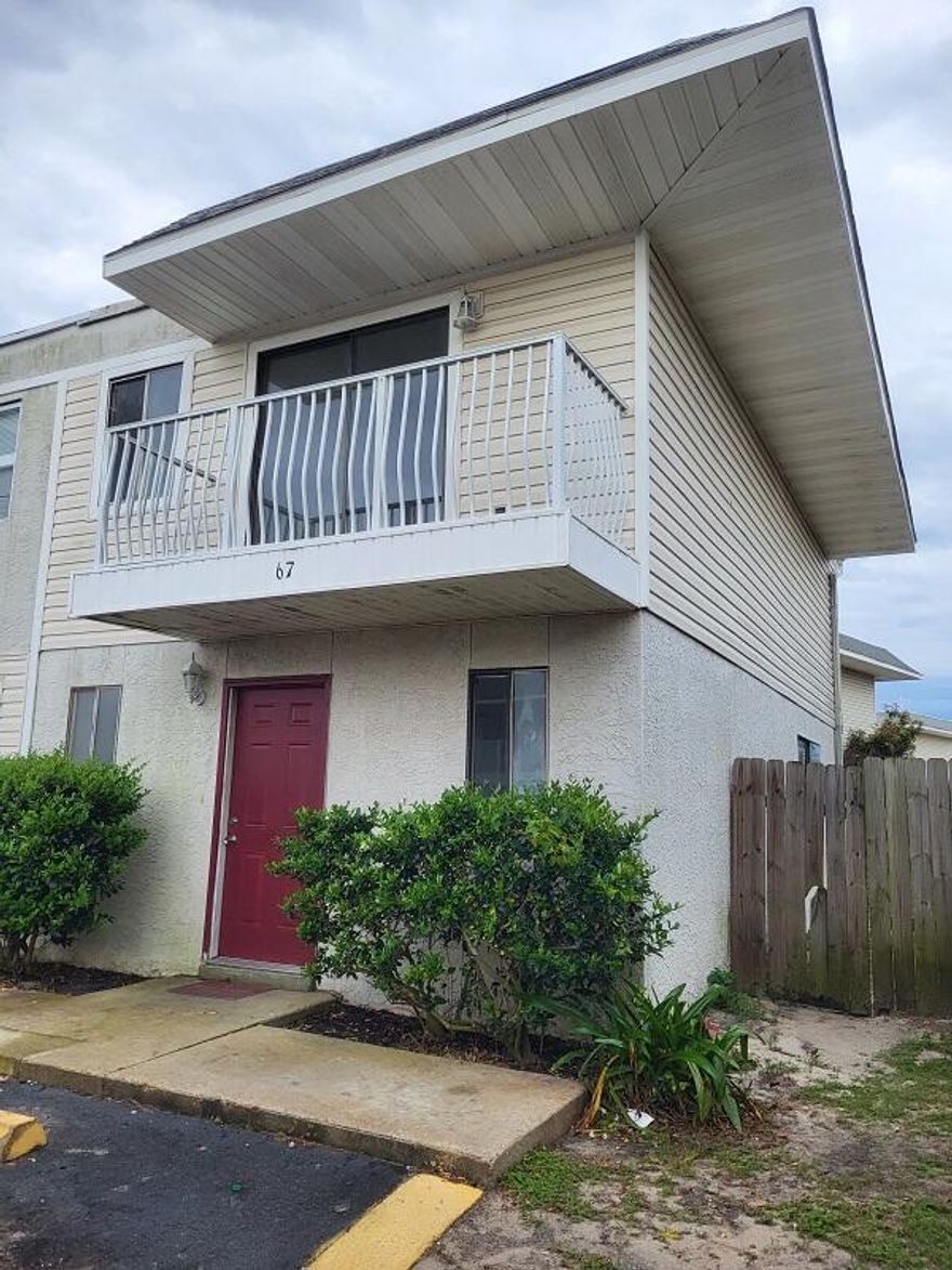 Great location in the heart of Destin! This townhouse has a minimal HOA fee ($77/month) and two bedrooms, two baths, & two parking spaces. Downstairs bathroom includes a shower. New paint. New stove. New carpet. New skylight. Laundry area upstairs. Balcony from Master BR. Open patio and a small storage room in backyard. Privacy fence. Community pool within walking distance from this townhouse. Basketball court for your enjoyment. No Short-Term rentals, however, this townhouse is a great long-term rental!
