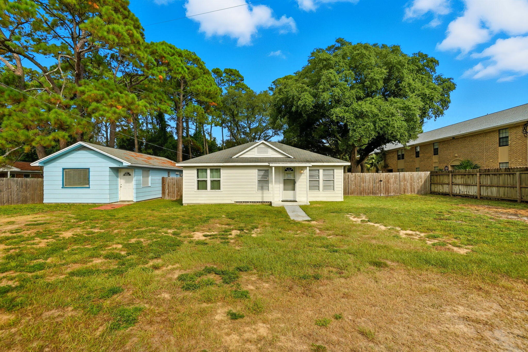 Investor's dream! Two properties on one lot in the heart of Fort Walton Beach offering dual income streams. 115 Chicago Ave is a 3BR/2BA home with 1,378 sq ft, built in 1951, and currently operates as a high-performing Airbnb that can be sold fully furnished and turn-key. 113 Chicago Ave is a 1BR/1BA home with 672 sq ft, built in 1978, and serves as a long-term rental generating $800/month on a flexible month-to-month lease. Live in one, rent the other, or maximize returns with both! 2020 & 2022 HVACs and 2021 water heaters. Located just minutes from shopping, dining, downtown Fort Walton Beach, and the sugar-white beaches of the Emerald Coast, this property provides instant cash flow and long-term potential.Property Website (https://www.115chicagoavese.com/unbranded)