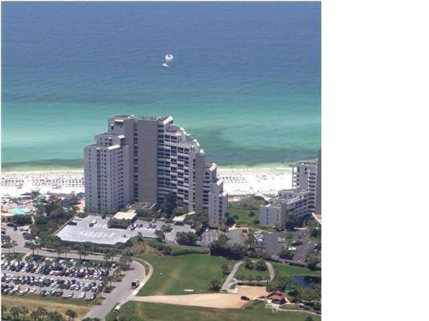 NEW PRICE..CONDO HAS BEEN TOTALLY RENOVATED!!!!!!!SOUTH BEACH LIVING ON THE EMERALD COAST. THIS 2 BEDROOM CONDO ON RESORT LOCATED on the 8th floor AT BEACHSIDE II with great views of the sugar white sanded beach and the beautiful emerald green water of The Gulf of Mexico. NEW CARRERA MARBLE COUNTERTOPS IN KITCHEN AND BATH, NEW STAINLESS APLIANCES IN KITCHEN AND TOTALLY NEW BATH. Nicely furnished condo with interior features including tiled flooring in living room, dining area, kitchen, and baths. NEW CARPET IN THE BEDROOMS. Crown molding in the living and dining areas. FLAT SCREEN TV''s. Condo is a great rental investment. Come take a look at the BEST BUY on the Beach!!! STRONG RENTAL INCOME.