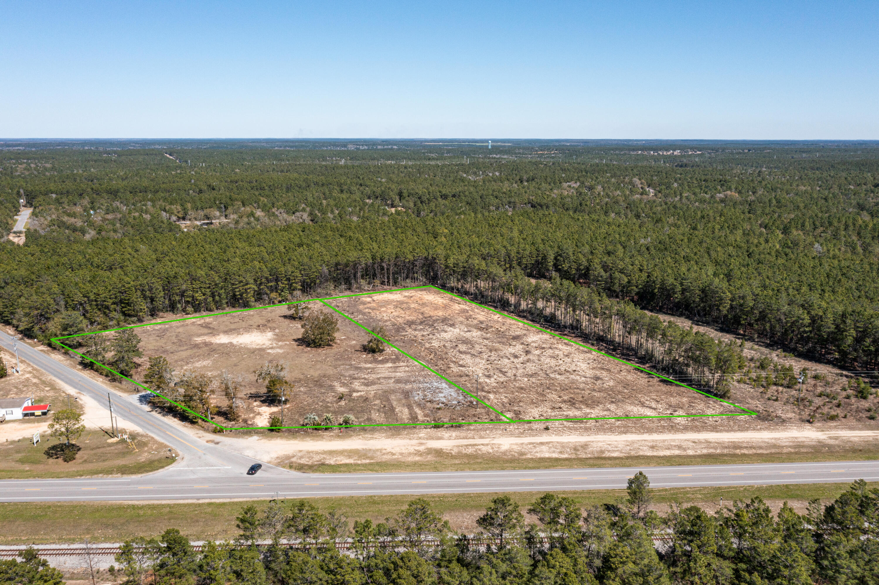 Location, Location, Location!!! Zoned General Commercial property, these 2 lots are being sold together to equal a combined total 6.74 Acres. They sit on the corner of Highway 90 and Laird Rd. with approximately 500ft of road frontage on each, and access to the property from both roads. Property does have Water & Electricity. Multiple uses allowed to include retail stores, RV or Mobile Home Park, warehouse or storage units. Close access to I-10 and Hwy 285, bringing plenty of passing traffic to the area. Conveniently located between Blackstone Golf Course and Shoal River Industrial Park. Close to Military Bases and beautiful Destin beaches.