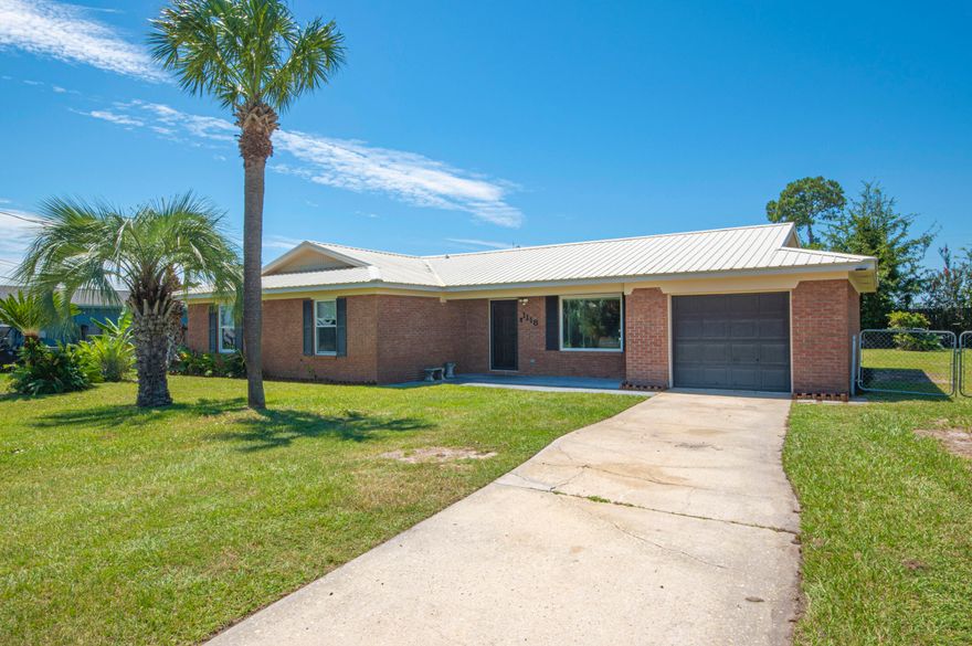 Welcome to your perfect family home, nestled in a vibrant community, close to the conveniences of everyday life. This delightful three-bedroom, two-bathroom brick ranch offers a blend of modern updates and timeless appeal, ensuring a comfortable lifestyle for you and your loved ones. Upon entering, you are greeted by a warm and inviting family room. This spacious area serves as the heart of the home, complete with a cozy fireplace that adds charm and warmth to those cooler evenings. The open layout makes it an excellent space for family gatherings or quiet nights in. Adjacent to the family room, you'll find an updated kitchen designed for both function and style. Modern fixtures, ample cabinetry, and sleek countertops provide the perfect setup for preparing meals and entertaining guests. Whether you're a seasoned cook or a casual meal preparer, this kitchen will meet your every need with ease. The master bedroom is a true retreat, featuring ample space to unwind after a long day. It includes a private master bath, giving you a personal sanctuary right at home. Each additional bedroom is generously proportioned, making them ideal for family members or guests. Step outside to discover a beautifully fenced backyard, an ideal space for children to play safely or for hosting family gatherings and barbecues. This outdoor area is both private and spacious, offering the perfect blend of relaxation and recreation. Location is paramount, and this property truly shines in its proximity to local amenities. A short distance away, you'll find Tyndall Airforce Base and an array of restaurants, making dining out a breeze. Shopping centers are conveniently nearby, providing every retail option you could desire. For families, local schools and parks are within easy reach, facilitating both education and outdoor activities for children. This property is not just a house; it's a place to call home. It offers a thoughtfully designed living space in a thriving community, perfect for creating lasting memories. The combination of its cozy feel, updated amenities, and superb location meets all the needs of a modern family. This Home is a MUST SEE!!