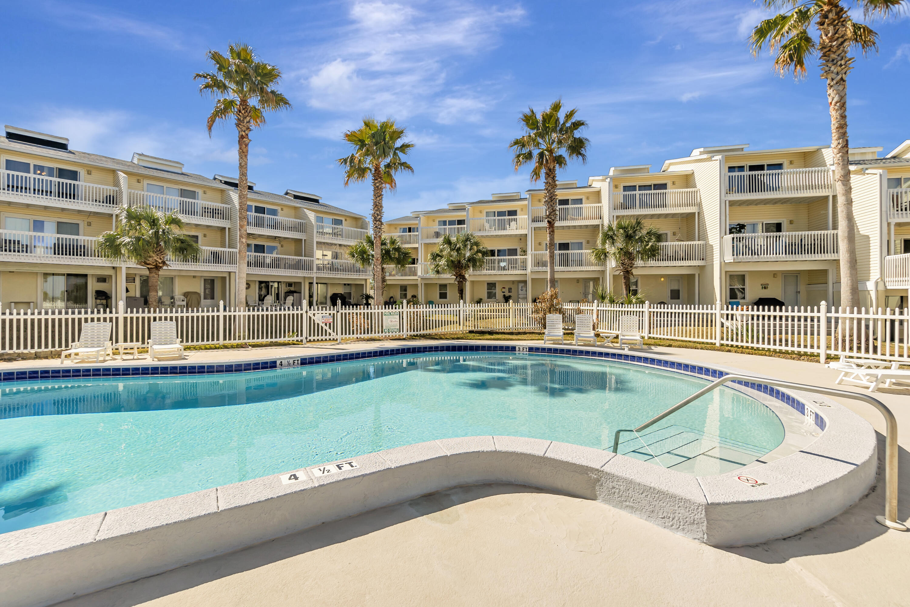 This beautiful 1,800 square foot living space is on a 0.02 acre lot in the highly sought after community of Paradise Point. The property is situated within a gated community of 34 townhomes and offers water views, granite countertops, an in-ground pool, a fishing pier, a boat dock, and access to the beach and sound, and no short-term rental. Enjoy stunning sunrise and sunset views from this unique offering.The fully furnished residence features three bedrooms and three and a half bathrooms. The interior spaces provide ample room for comfortable living, with thoughtful design elements throughout. The kitchen is equipped with granite countertops and stainless steel appliances, offering a stylish and functional workspace.True coastal living island style on Navarre Beach and the Gulf.
