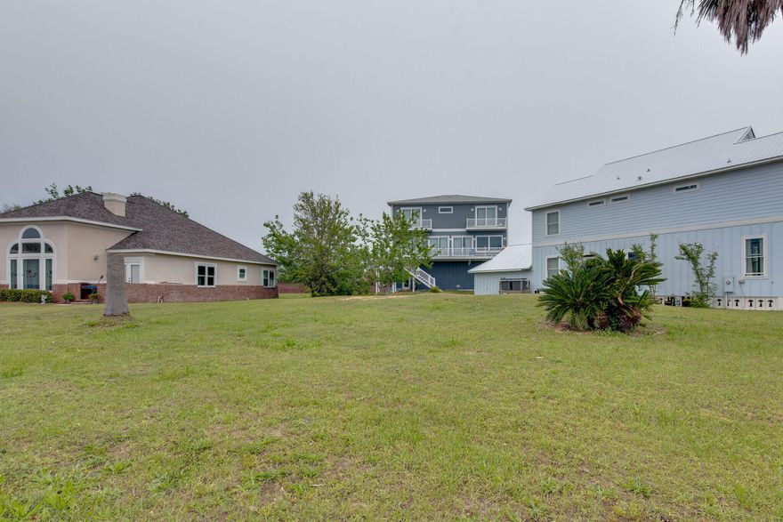 Have you ever dreamed of living by the water?  That dream can still become a reality!  Located on a quiet street near Pensacola Country Club, this lot is a great opportunity for any builder or owners looking for the perfect spot to place their dream home.  With gorgeous sunset views of the bay and a short drive from the downtown area, it doesn't get much better than this!