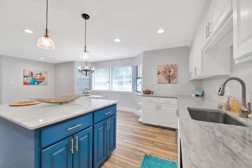 Beautifully renovated 3 bedroom, 2 1/2 bath home located on a corner lot within Robledal Estates. Fall in love with the newly renovated kitchen, offering new appliances, granite countertops, large island, ample counter space/cabinets, and perfectly designed for entertainment! Tons of natural light throughout, New Fixtures, New carpet in living area and bedrooms, and freshly painted. Master bedroom offers a large walk in closet and bath has double vanity. Neighborhood offers water access and deeded boat launch. Don't miss seeing this one!