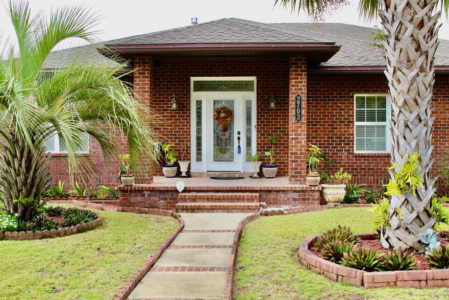 New roof to be installed prior to closing! Large home (over 4000 sq ft) with a mother-in-law suite, south of I-10 and on a cul de sac. This is a sturdy ICF (insulated concrete forms) home built with foam blocks, reinforced with steel rebar, and filled with concrete making it very energy efficient and stronger than traditional builds. This one owner custom built home has lots upgrades: granite, crown molding, decorative tile, recess lighting, home stereo throughout the home, and installed gas grill.  First floor (mother-in-law suite) features garage, 2 bedrooms, full bath, kitchen, oversized laundry, living room, extra-large storage room and screened in porch. Second floor has 3 bedrooms, 2 baths, living room, dining, kitchen and second living/den area plus a Florida sunroom.