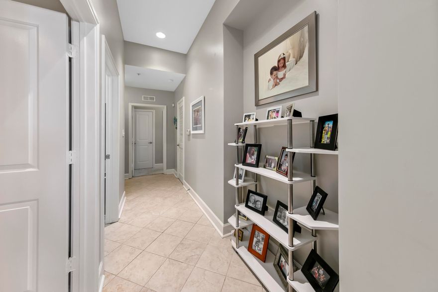 Beautiful 3 bedroom, fully furnished, turnkey unit!!  Looking for a premier development with the best amenities?  Well look no further than Island Reserve!  This large 3 bedroom unit is all on one level and makes the perfect primary or secondary residence. All furnishings are less than 8 months old including the blinds and washer & dryer! No short term rentals are allowed in this property. The large spacious unit has a private balcony, with a slight view  of the pool as well as the lavish landscaping throughout the development.