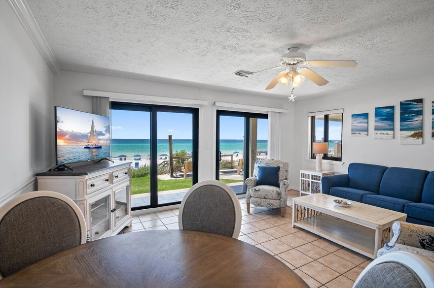 Rare offering of a Gulf front, ground floor condo located in Crystal Beach, with steps to your toes in the sand!  Freshly painted interior, new carpet in bedroom, and new tiled shower!  Projected rental revenue of $58K [great ROI] and $50K from a company that currently manages units at this complex are under the Docs tab.  Seller has not rented.  Large one bedroom with bunks in hallway, and Jack & Jill bathrooms that share shower area.  Conveniently located to Destin Commons with lots of shopping and restaurants.