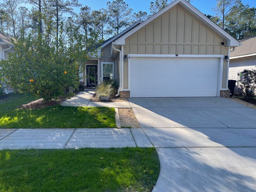 Beautiful home located in rapidly growing Lagrange Landing located in the heart of Freeport. This lovely home has an open concept with lots of natural light that feels like home! Wooden cabinets and granite counter tops with a bar with extra seating for family and friends. Master bedroom has double granite vanity, shower, garden tub and walk in closet. Large master bedroom with additional privacy. Fenced in backyard with recently added pergola and bench swing added 2021! Neighborhood has fenced in community pool just down the street with additional playground area, and a community path leading to creek area perfect for paddle boarding/kayaking! Seconds to HWY 20 to bypass beach traffic in peak season. Minutes away from South Walton/30A beaches; behind Publix and Shoppes of Freeport