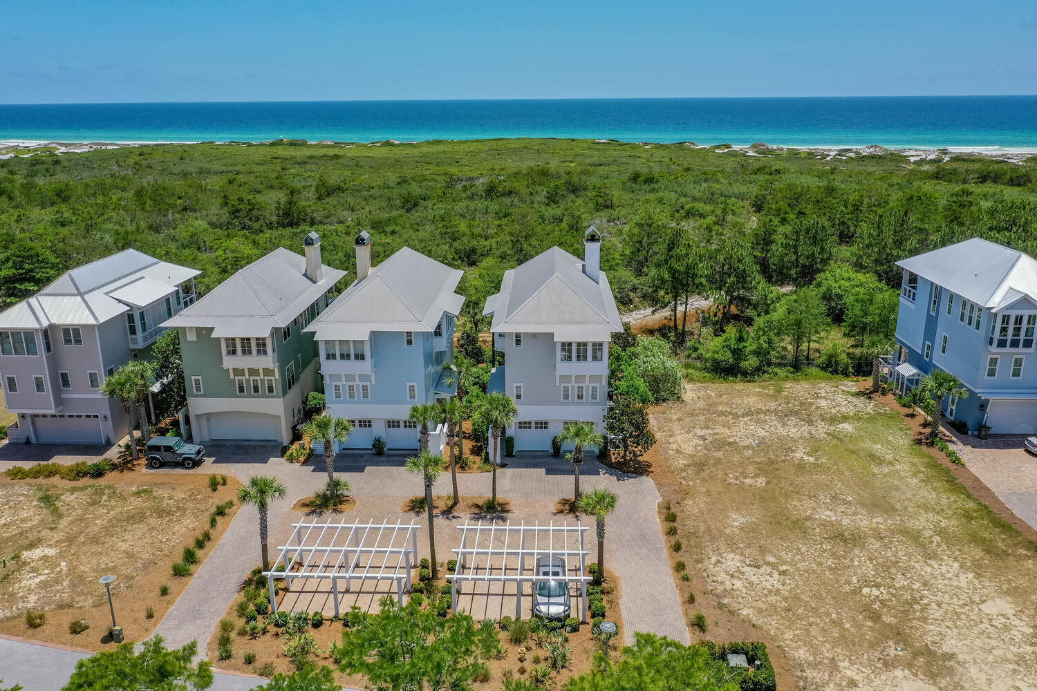A truly exceptional home with views of the Gulf of Mexico offered for a long-term rental lease. This fully furnished beach home with a private elevator, and beautifully decorated french-inspired furnishings has been featured in coastal magazines. Upon entering on the first level, you'll find a custom built-in queen sized bunk room with a large bathroom, farmhouse sink, and huge shower. As well as a laundry room, owners closet, patio and 2 car garage. As you take the private elevator or stairs to the second floor, you will find 3 generous sized bedrooms with ensuite baths, including the primary suite, and a quaint office nook. Through the windows of the 2 guest bedrooms, you'll see the lily pads on Cypress Pond. The primary suite is a romantic setting with gorgeous views of Topsail Reserve from the covered patio. The ensuite bathroom has a clawfoot tub, two separate vanities, built-in closets, and large private shower. As you head upstairs to the third floor, you will be inspired by the incredible Gulf views and the attention to detail in the kitchen, dining room and 2 living areas. The kitchen has high-end Viking appliances, an expansive kitchen island, and spacious dining room for entertaining. The sitting room off the kitchen area, gives you space to relax and watch TV or read a book. In the spacious great room, you can cozy up on the large sectional sofa and enjoy the warm fireplace. On the balcony, there are 2 porch swings and a dining table, which allow you to take full advantage of both the sunset and sunrise views. Cypress Dunes is a gated community that is surrounded by Topsail Hill State Park, with amenities that include tennis/pickle-ball court, pool and spa, exercise gym, clubhouse, trees and green space, ponds, and walking bridges. The nearest beach access is just down 30A at Topsail Hill State Park next door or the nearby Dune Allen public beaches. Enjoy the quieter side of 30A and nearby restaurants like Stinky's, 3 Sons BBQ, and Vue on 30A.