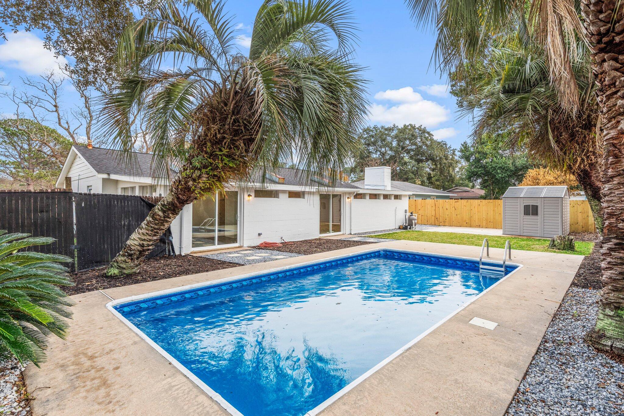 This 3 bed 2.5 bath home has been extensively remodeled and upgraded inside and out! It's an entertaining oasis with a large den, fireplaces, open kitchen concept and and inground pool. Every detail was noticed in this home from interior to exterior. New windows and doors, hvac, roof, hwh, complete kitchen and bathroom remodel, paint inside and out, lvp floors, light fixtures, appliances, landscaping and shed, new pool liner and pump/filter, rewired with copper wiring and replumbed. It's ready for new owners!