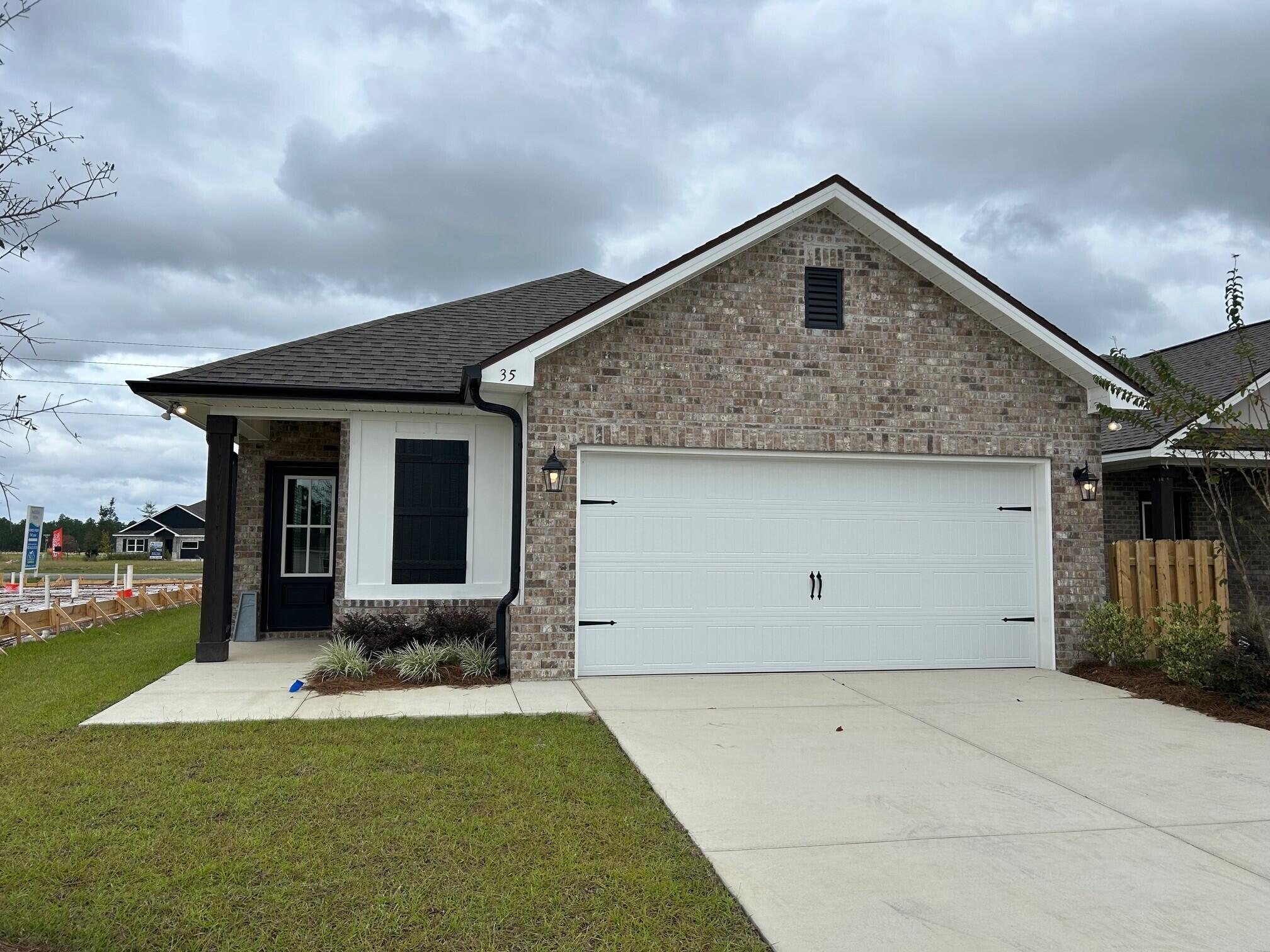 Awesome builder rate plus FREE front gutters. Restrictions apply.The ECKERT II G in Natureview community offers a 4 bedroom, 2 bathroom open design. Upgrades added (list attached). Special Features: double vanity, large walk-in shower, and walk-in closet in master bath, kitchen island, pantry, covered porches, undermount sinks, custom kitchen backsplash, LED lighting, crown molding, ceiling fans in living and master, framed mirrors in all baths, smart connect WIFI thermostat, smoke and carbon monoxide detectors, landscaping, architectural 30-year shingles, flood lights, and more!Energy Efficient Features: water heater, electric kitchen appliance package, vinyl low E windows, and more! Energy Star Partner.