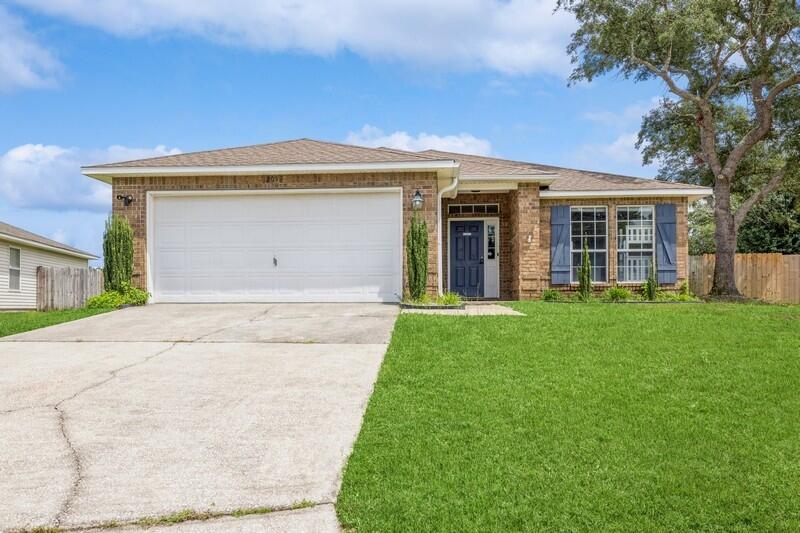 Charming Updated Home in Navarre - Fully Furnished!Welcome to this beautifully updated 3-bedroom, 2-bath traditional-style home in Navarre. Featuring a split floor plan with hardwood and tile floors throughout, this home offers both style and convenience. The open living area flows into an updated kitchen with stainless steel appliances. The master suite is a true retreat with a garden tub, separate shower, dual vanity, water closet, and walk-in closet.Enjoy the outdoors on the covered patio and in the fully fenced yard. Located just 11 minutes from Navarre Beach, 20 minutes from Hurlburt Field, and 50 minutes from Pensacola Naval Base. Fully furnished and move-in ready!Outdoor shed and Furnishings are AS - IS.