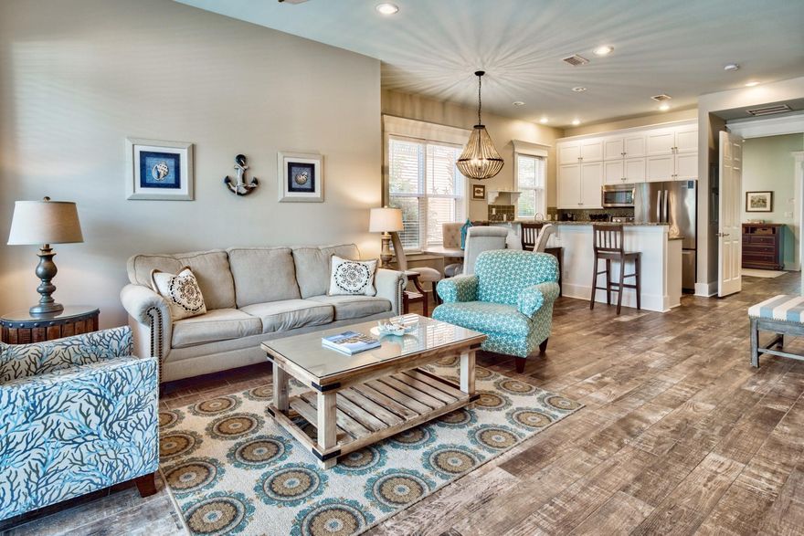 This Miramar Beach Villa is the perfect place to enjoy as second home or vacation rental. Tile floors can be found throughout the first level. The kitchen features granite counters, stainless steel appliances, and a charming breakfast bar. The dining area and living room project a spacious feel with French doors that lead to a covered patio. The bedrooms offer large walk-in closets and private baths with solid surface counters, as well as access to the patio or private balcony. Its spacious design is further enhanced by 10-foot ceilings found throughout. This gated and secured community offers amenities that include a large, seasonally heated pool as well as deeded beach access within close proximity.