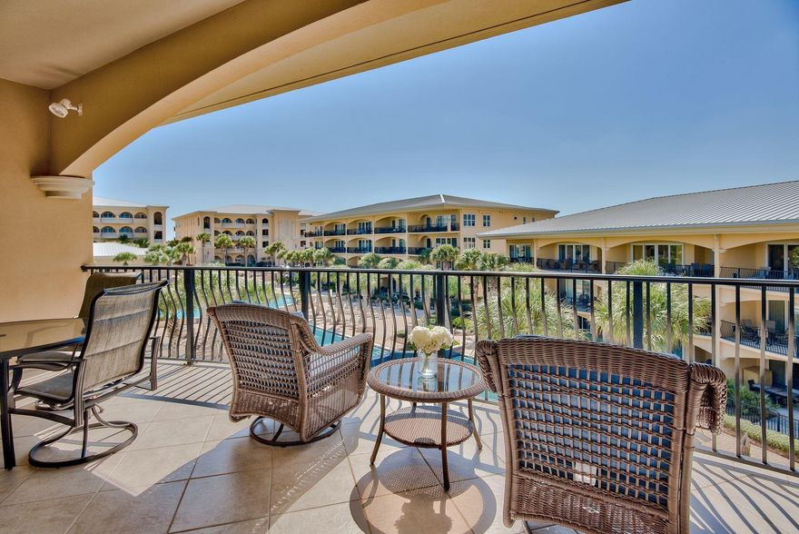 This impressive top floor condo in Adagio is designed for the ultimate beach lifestyle. Located in a prime Gulf-front community in unspoiled Blue Mountain Beach, the complex includes a 8000 Sq Ft Tri Level pool with Fountain and 15-foot diameter hot tub. Adagio has an Gulf Front pool that is heated during the off season. There's an on-site fitness room with state-of-the-art treadmills and weight training equipment, and direct access onto the stunning white sandy beach. Gleaming marble floor tiles laid on the diagonal draw the eye to the generously sized balcony with pool and gulf views. The kitchen features rich wood cabinets and a full range of stainless appliances beneath cool mottled granite counter-tops. There's a handy breakfast bar for enjoying a pancake breakfast while planning your day at the beach. Formal meals and entertaining can be enjoyed in the dining area while the generous sitting space invites you to put your feet up and watch TV while gentle sea breezes blow through the open patio doors. This plush pool-front condo overlooks the 8,000 sq.ft three-tiered main pool, which is enhanced by gushing waterfalls and an eye-catching fountain. Surrounded by lounge chairs, it's perfect for sun worshipers as an alternative to the beach. Just beyond the pool, the sugar-white sands of Santa Rosa Beach offer unlimited walks accompanied by the sound of the gently turning waves. The beach is lined with waving sea oats on wind-sculpted dunes that are a natural haven for nesting sea turtles. Rent a beach bicycle and cycle along at sunset for unforgettable red sky views. If you don't intend to live at Adagio year-round, these well-located properties are always in demand and command the highest vacation rentals. It's a smart way to create passive income from your dream beach condominium when not in use.