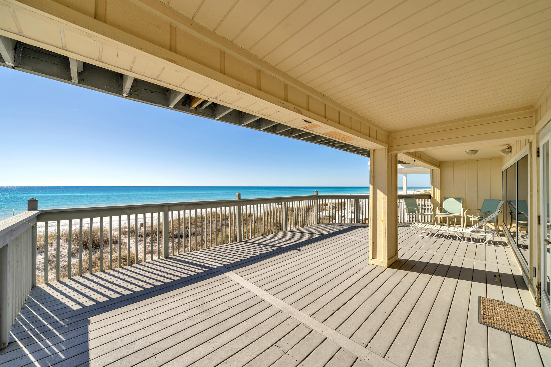 Two gulf front townhomes combined into one large unit on 50' lot on Scenic Gulf Drive. This large townhome has 5 bedrooms (two master suites) and 5 baths on two levels with a gorgeous view of the beach and gulf waters. The kitchen has granite and stainless Jenn-Aire appliances with wood flooring on lower level and carpet upstairs. A large 40' deck overlooking gulf with an outside shower and extra room below on beach level including locked storage for beach chairs. Sleeps 12 with rental projections of $179,000 annually. NO HOA FEES