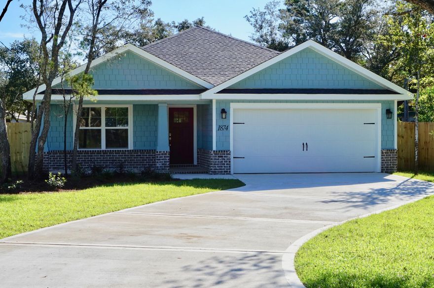 NEW CRAFTSMAN Custom Built Home in EAST NAVARRE~This luxurious 3 bed/2 bath floor plan is under construction...and will be ready in time for your late Summer move in ~Great Location within easy driving distance to the Waterfront Navarre Park..and easy access to Navarre Beach, shopping and Hwy 98 to Hurlburt Field AFB.This Stunning Robbins Builders Custom Home offers trend setting features~Greeted by a walk in foyer sweeping through to your open floor plan ~Large kitchen enjoying Shaker custom cabinets with crown molding, beautiful granite counter tops~Under mount sink~S/S appliances,Huge walk in pantry and separate utility room ~wrap around Center Island with pendant lights ~open flow to the family room, Wood look flooring through the foyer, main living area, with tile in the laundry and bathrooms.Large Master with trey ceiling & ceiling fan. Master bath offers a Gorgeous custom tiled shower ~Granite double vanity with rectangle under-mount sinks ~ picture frame mirrors & brush nickel fittings. Additional Bedrooms are a good size with double closets and ceiling fans~Home has front and back covered porch and is situated on a large lot with grassed yard lots of trees and fenced across the back. TAEXX in wall pest control system~ Hurricane fabric shield protection and dimensional shingle roof for lower insurance premium. Upgrades throughout bull nose corners , recessed lighting ,framed mirrors, deluxe lighting package,50 Gallon water heater, garage door remotes, attic drop down stairs~ to name a few......Call today for further information.
** pictures of a similar completed home so colors and finishes may vary.