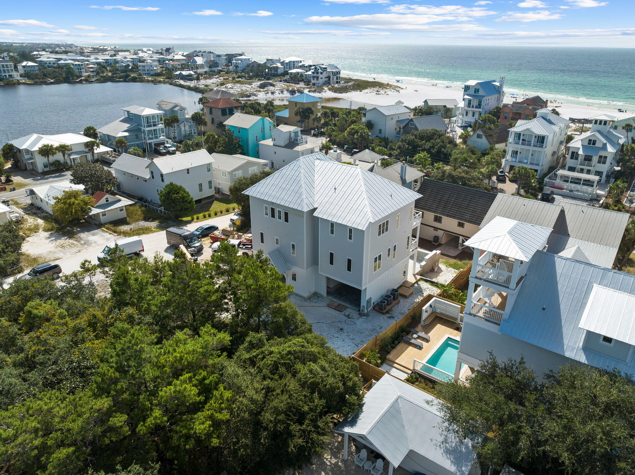 'Something to Sea,' as this Santa Rosa Beach property is affectionately named, is quite literally just that...something to see! Located just steps to the beach, 24 Dalton Street is a custom-built, exclusive retreat offering the best of beach living: privacy, enviable Gulf of Mexico views, and Eastern Lake water views, all being built on not one, but two large lots, in a quaint part of 30A. The property's prime location and architectural details on three levels of indoor and outdoor living exude a sense of place, where one instantly knows they are both in the heart of South's most sought-after beach town, yet quietly tucked away near the seashore.