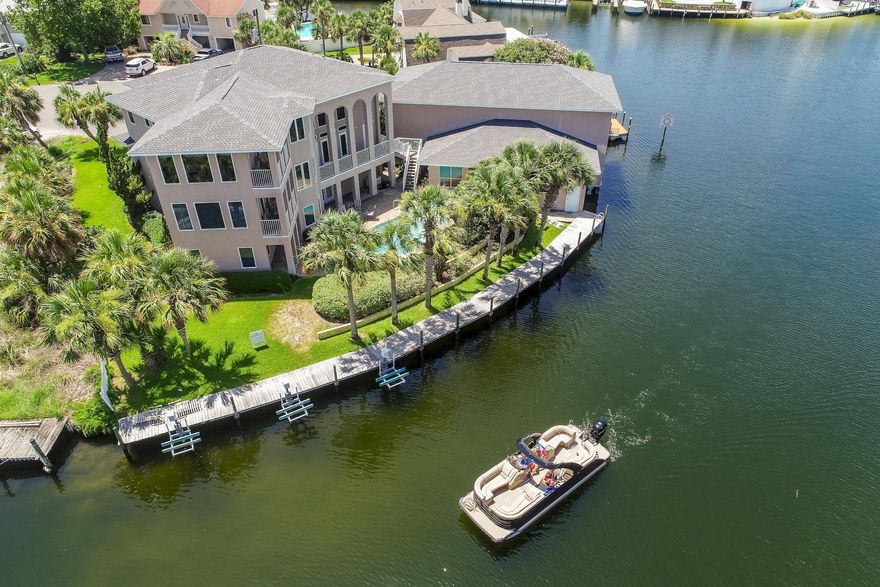 Welcome to the New 500 Osceola! One of the most Prestigious and Well Known Homes of Holiday Isle has a new look! From the Roof to the bottom floor has been replaced or updated! The Home which is known by many as ''The Yachtsman Home'' can now be known for so much more. After many months of work, the home will be known for its Coastal Chic and Contemporary beauty. This home boasts 191 feet of water frontage, 3 Sea-doe lifts and the amazing Yacht Garage which will hold a 57 Boat and a lift in the adjacent stall that will accommodate easily a 35' boat. The home has 4 large bedrooms, office, formal dining, an entertainment room off of the pool, a commercial elevator and the list goes on and on. Professionally and Beautifully furnished for the most indiscriminate of Buyers!