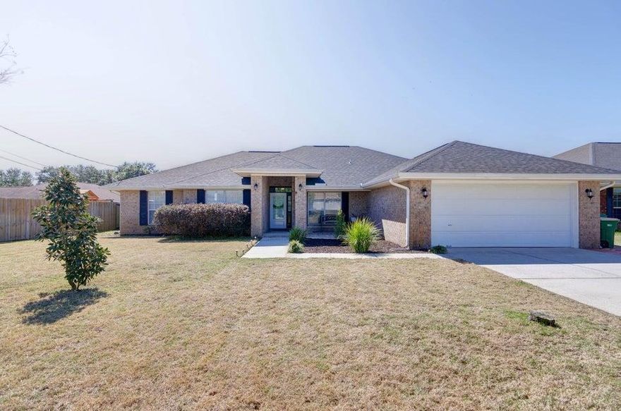 Available in JULY!Welcome home to this stunning and spacious all brick east Navarre home! Featuring four bedrooms PLUS a formal dining room AND a massive bonus room with a huge backyard. Located just minutes from Navarre's beautiful beaches and a short drive to Hurlburt Field. Upgraded kitchen where you'll find custom cabinetry (extended to allow plenty of storage and prep space!) with tasteful granite countertops and modern backsplash. Master bedroom features two separate walk in closets, a soaking tub and separate shower. Contact Navarre Beach Realty at 850-936-0700 or come by the office at 8666 Navarre Parkway in the Winn Dixie Shopping center. Office hours are Monday-Friday 9am-5pm. No weekend showings. This home is currently a vacation rental until July. Appointments are required.