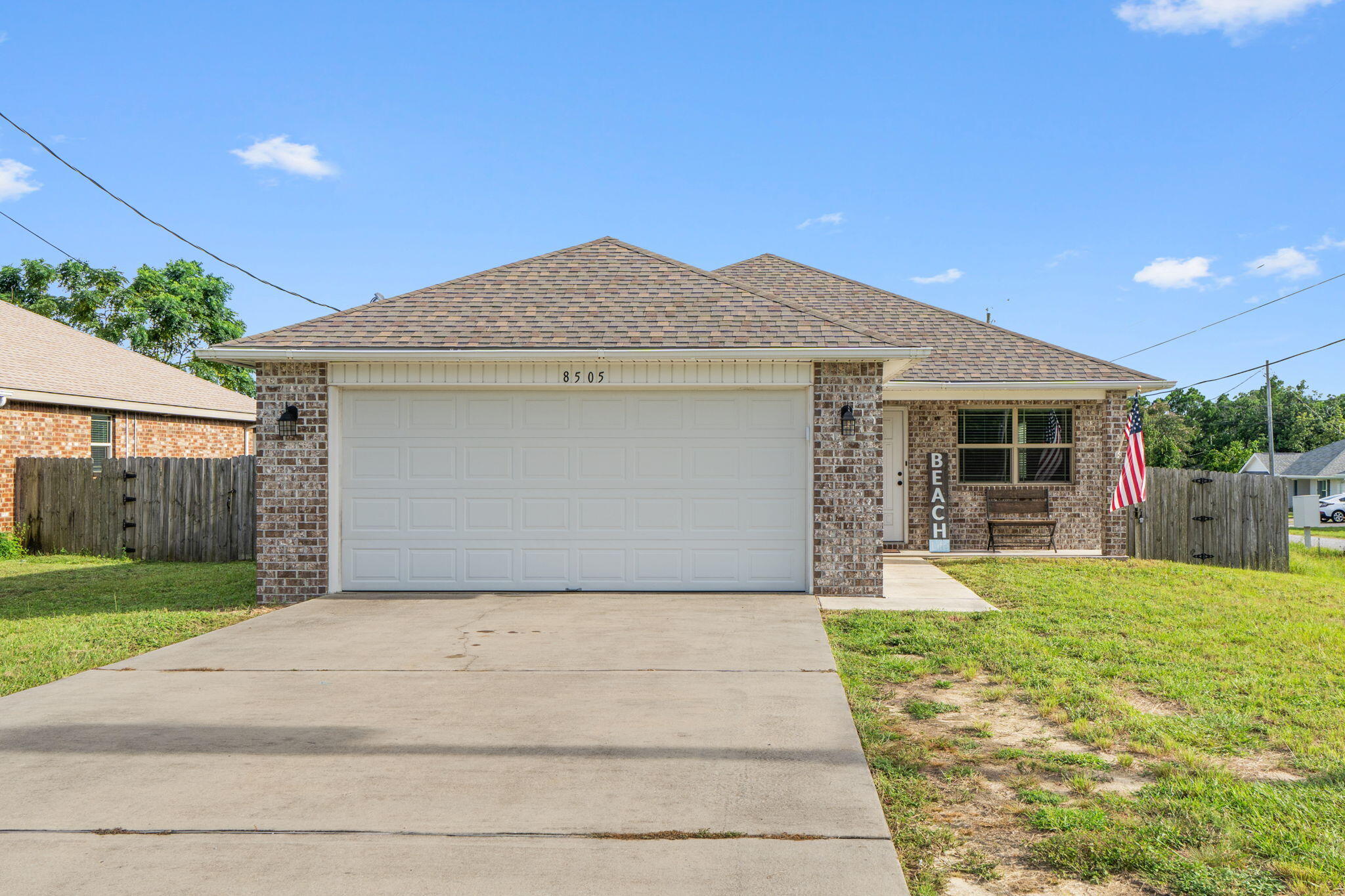 Fantastic all-brick 3-bedroom,2-bath home in central Navarre, just minutes from the beach, shopping, dining, and schools--plus NO HOA! Built in 2016, this split-bedroom, open-concept floor plan features a spacious living room with trey ceiling. The kitchen offers granite countertops, custom solid wood cabinets, stainless steel appliances, breakfast bar, tile flooring, and a pantry.The large master suite includes a walk-in closet with custom shelving and an en-suite bath with double vanity. Enjoy a huge indoor laundry room with custom cabinetry, a covered back patio, and a privacy-fenced backyard with fire pit--perfect for outdoor living. Additional highlights: 2-car garage, gutters and Energy Star Low E windows. Under 2 miles to Navarre Beach and approximately 10 miles to Hurlburt Field!