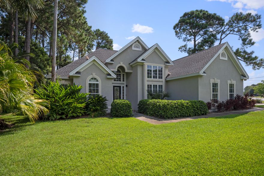 Beautifully renovated home on an incredible corner lot with NO HOA DUES. As you walk in the front door you are welcomed by soaring ceilings and a richly stained hardwood floor that invites you into the home. The open living space seamlessly transitions into the beautifully remodeled kitchen with bar seating, stainless steel appliances including a double door wine chiller, beyond this is a sun room with cathedral ceiling providing access to the fenced back yard with patio. The split floor plan provides privacy while maintaining a convenient, single level living lifestyle. The generously sized master bedroom provides an additional nook area which is perfectly suited for a home office.