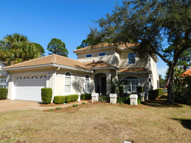 One of the finest homes in one of the finest neighborhoods! Located in the picture perfect Sunset Beach neighborhood, this custom built home was a Parade of Homes WINNER! Sunset beach offers a resort style swimming pool and club house that is yours to enjoy. Step inside and take in the custom features throughout while you look out back over the par 3 hole #6 of Bluewater Bay. Beyond that is a 3 acre lake full of Large Mouth Bass. Inside you will find soaring ceilings with expanded crown molding throughout, earth tone colors, 2 master suites, a Chef's delight of a kitchen and a very open, sunny floor plan. There is a master bedroom with custom built bathrooms on each level of the home. Make this home yours today!