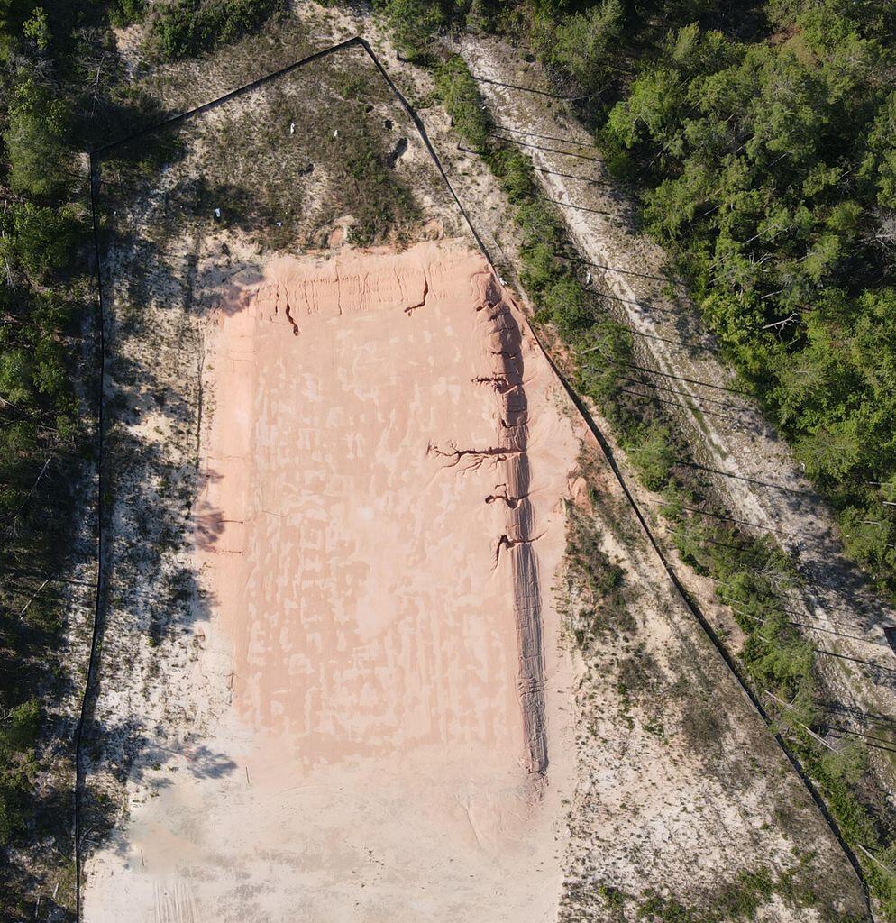 LOT FOR SALE! 1.91 acre lot is located in the gated golf community of Windswept Estates. Property has been cleared, leveled and ready for you to build your dream home! Water tap has been paid so extra savings on construction. Neighborhood amenities for homeowners and their guests include a clubhouse, large swimming pool, two tennis courts, basketball court & playground for the family. Call agent for more details.