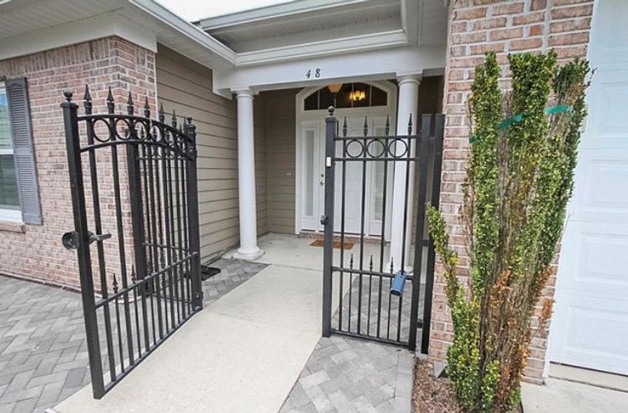 One of a kind in Hammock Bay, a must see! Unique home professionally remodeled and upgraded, it is beautiful! Take a dip in the saltwater pool while enjoying the view overlooking the lake! Tons of closet space and storage. This home is immaculate with several custom touches throughout. The home has a 500 sq. ft. addition to the kitchen and living room. The kitchen has been completely remodeled to include: new cabinets, hidden butlers pantry, cabinet integrated TV, all new side by side fridge and gas stove (12/2016); ice maker, farmers sink, wall gas/electric fireplace, $30,000 in new hurricane windows (2016). Well insulated home with cedar storage closet, outdoor shower, new on demand water heater and whole house on demand generator. The kitchen is open to the living and dining room.