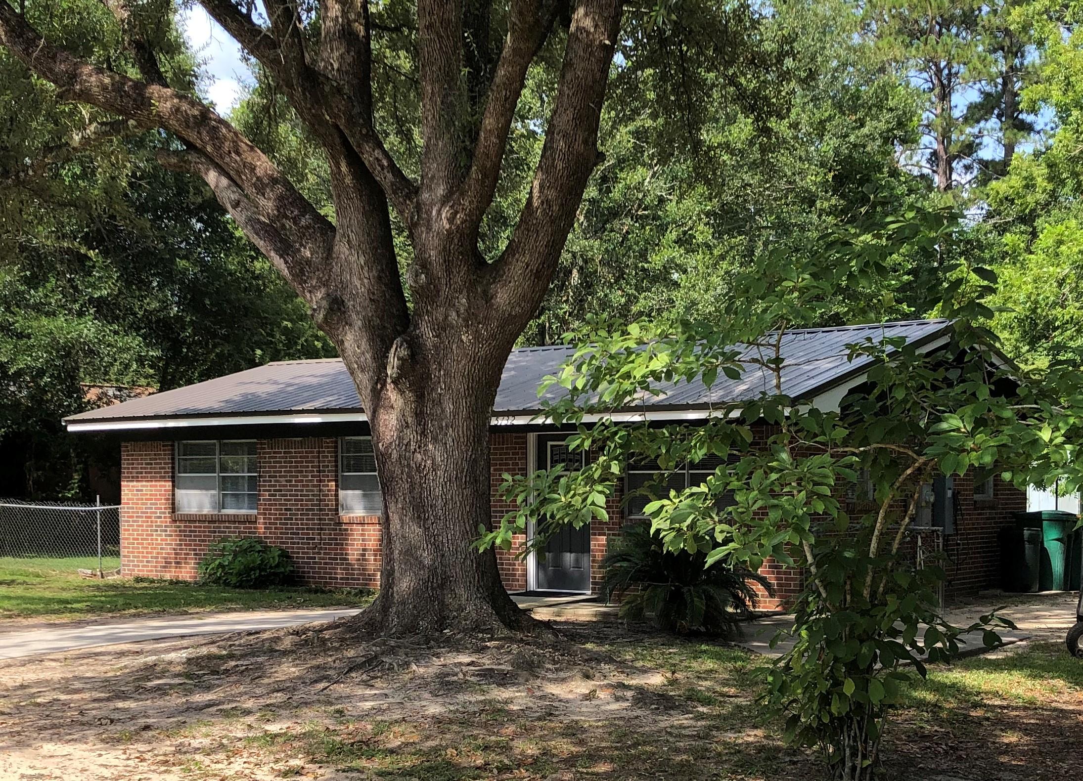 Only new home owner activity here is unpack the boxes! Totally remodeled 3 bed/2 bath home on gorgeous, 45,000 SF shaded, fenced rear lot. Kitchen features new gas stove, dishwasher, microwave and pantry. Has city water PLUS 300 ft well. New furnace-2015, roof - 2019, new water heater and high end washer/dryer included. Also 100 AMP power available. Pecans anyone? Huge pecan tree in center of back yard.