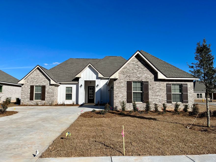 The CEZANNE IV G in The Trails at Hammock Bay community offers a 4 bedroom, 2 full bathroom, open and split design with a computer nook. Upgrades added (list attached).  Special Features: double vanity, garden tub, separate custom tiled shower with frameless door, and walk-in closet in master bath, kitchen island, walk-in pantry, boot bench in mud room, covered patio, recessed lighting, undermount sinks, bronze plumbing fixtures, framed mirrors, smoke/carbon monoxide detectors, landscaping, architectural 30-year shingles, flood lights, and more!Energy Efficient Features: tankless gas water heater, kitchen appliance package with gas range, low E-MI windows, and more!