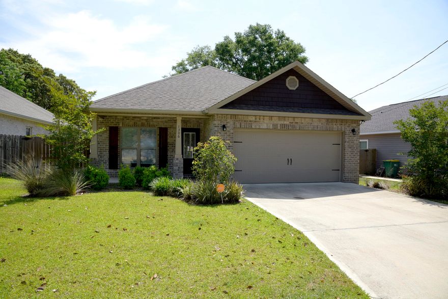 Completed in 2018, this beautiful 4bed/2bath craftsman style home is better than new! You will love the elegant granite counter-tops; custom soft-close, all-wood cabinets in the shaker style; slate-finished GE appliances; a large walk-in pantry with a large central island and breakfast bar. The open main living areas have vinyl plank flooring, with tile in the bathrooms & frieze carpeting in the bedrooms. This custom home also includes 9-11' ceilings, crown molding, tray ceilings and arched walk-throughs. It is centrally located in Niceville in close proximity to schools, shopping, Eglin AFB and the spectacular beaches of the Emerald Coast! Don't miss out on this fantastic property! Please plan to attend the Open House on May 1st from noon-3:00 for your first look at this beautiful home!