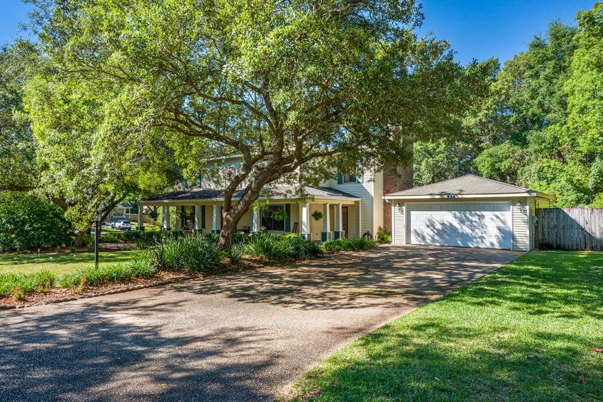 Kick Out in place for inspections. Unique find in Bluewater Bay. Spacious and beautiful, this is a must see Southern home. New pillars installed on this traditional wrap around porch in 2016 flanked by gorgeous oak trees welcome you home. A newly remodeled kitchen in 2016 offers gorgeous cabinetry and new appliances. A breakfast bar, an eat in dining space as well as formal dining room to satisfy any dining style or get together. Laminate flooring installed in 2018 throughout most of the home and a downstairs guest bath, which has been tastefully updated. The great room has a floor to ceiling white washed brick fireplace with gas access and a built in wet bar. This marvelously spacious room offers access to a screened-in back porch, delightful front porch and the office/study roo