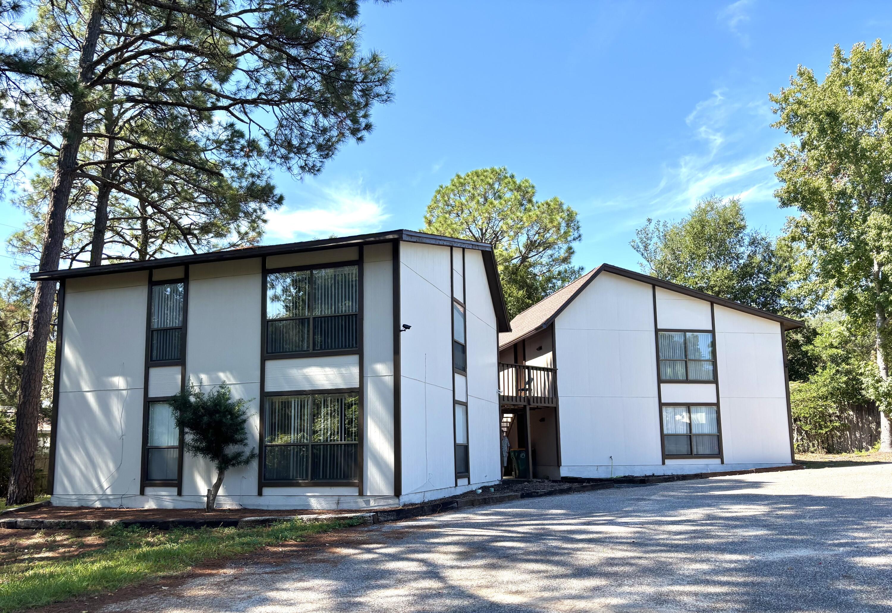 This very spacious second-floor apartment features a charming wooden balcony right outside your front door, perfect for enjoying a morning coffee or evening breeze. Inside, you'll find a large kitchen with abundant cabinet and counter space, along with a convenient breakfast bar. The open living/dining combination provides a comfortable and flexible living area. Community laundry is available with coin-operated washer and dryer access in the building next door. No Pets. All Coastal Realty Services residents are enrolled in the Resident Benefits Package (RBP) which includes renters insurance, HVAC air filter delivery (for applicable properties) and our best-in-class resident rewards program and much more! More details upon application.