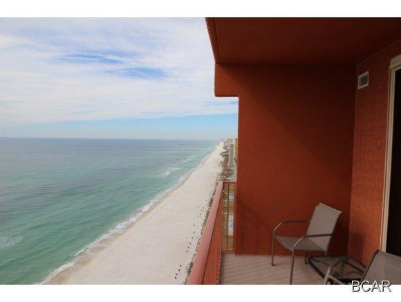 This is the penthouse unit at Shores of Panama. The penthouse level has stainless steel appliances, upgraded granite and raised panel kitchen cabinetry. Next door to Pineapple Willie's, this beach front complex is right across the street from Super Wal-Mart and less than a block to Ripley's Believe it or Not and Wonderworks. Plenty to do for the whole family or simply sit back and enjoy this mediterranian style resort with almost 500ft of the Gulf of Mexicos' beaches, 14,000sqft of lagoon style pool that is lovely to look at, but better to lounge in, workout facilities, indoor heated pool that has just completed renovations, 2 day spas, a tiki bar and grill and all covered attached parking. Pets are allowed and security onsight
