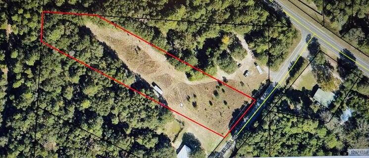 Only 200 ft to Hwy 4 in Baker, this lot has power pole, a pump shaft, and a septic tank (that are not warranted). Irregular lot is partially cleared as it was one homesteaded but now it is an empty lot waiting for you to build or just retain as an investment. Additional land available (1.98 acre adjacent). Bring us an offer!