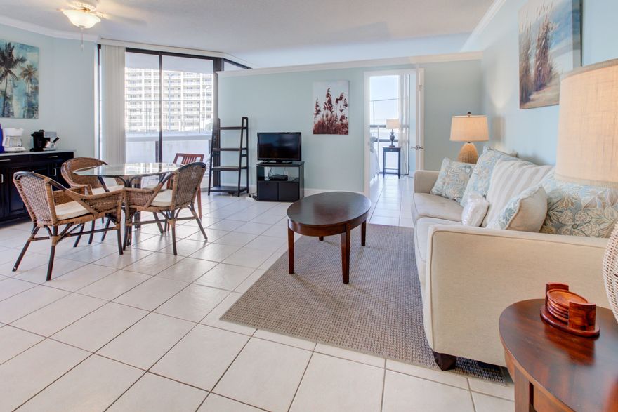 This fabulous condo in the Destin Surfside building with a covered balcony off master and family room and views of the Gulf of Mexico is exceptional. Equipped with a stove, dishwasher, microwave and refrigerator. A separate walled King bedroom plus sofa sleeper makes this a place perfect for extended stays. Three large sliding glass doors to your private spacious Gulf facing balcony. Enjoy living at the beach and smell of salt air.Nicely finished with tile flooring, granite in bathroom and tile surround at the tub shower. Comes fully furnished and rental ready.Great for all ages, no steps to get you to the private fitness center, on site restaurant, pool or beach walkover all within a minute walk. Covered parking