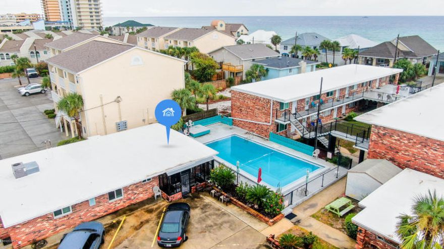 Walk Right Across the Road to the White Sands of the Gulf of Mexico. This 2 Bedroom 1 Bath Condo is Located Just West of Schooners. Close to St Andrews St Park, Multiple Marinas and Plenty of Entertainment. This Unit is one of the largest in Sunshine Shores, and features a New Roof, 1 Yr old A/C with A Transferable Warranty. Great Pool Views, First Floor, so Not Stairs, Hurricane impact windows, Walk in Closet that could be used as Storage or Laundry Room and a Roomy Screened-In Front Patio. The HOA is very Affordable and Covers Lawn & Pool Maintenance, Water, Ins, Pest Control, Trash, Cable and Sewage. If your looking for an Affordable Condo Close to the Beach or an Income Producing Property, you will want to look at This Property.