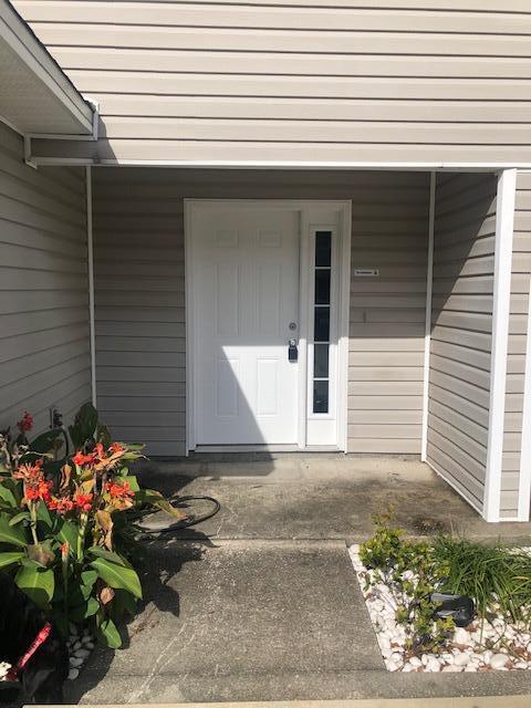 REALLY GOOD SIZED TOWNHOME. THIS UNIT HAS AN OPEN FLOOR PLAN AND TILE FLOORS IN THE FOYER, KITCHEN AND BATHROOMS. THE BATHROOMS UPSTAIRS ARE EACH IN A BEDROOM CREATING TWO MASTER SUITES . THE LAUNDRY ROOM IS UPSTAIRS ON THE LANDING BETWEEN THE TWO BEDROOMS! THIS UNIT HAS PLENTY OF STORAGE WITH LARGE CLOSETS IN THE BEDROOMS AND FOYER PLUS ADDITIONAL UNDERSTAIRS STORAGE AND A LOCKABLE UTILITY ROOM ON THE COVERED PORCH