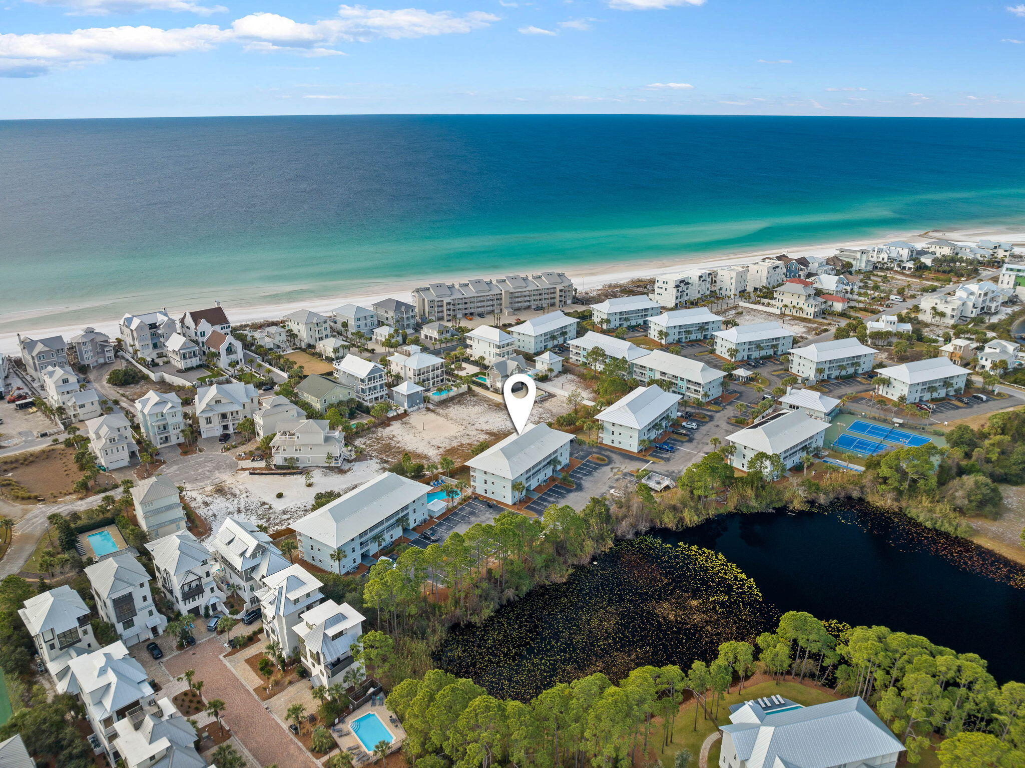 Just steps from the sparkling emerald waters of 30A lies this 2-bedroom 2-bathroom getaway that has been renovated and is being offered fully furnished to please you and your guests. Recent updates include new AC and hot water systems, upgraded kitchen cabinets, stainless steel appliances and quartz countertops. Beachside Villas recently undertook a complete exterior renovation as well, featuring new metal roof, cement-hardiboard siding along with new doors and windows. This low maintenance condo is steps from tennis, pools, and the beaches of 30A. The convenience of the ground floor and short walk to the Gulf makes this a great buy!The complex of Beachside Villas offers 2 pools (1 heated in the off season), tennis courts, shuffleboard, docks with lake views and fishing. Eastern Lake is right outside for your paddle boarding and scenic views!