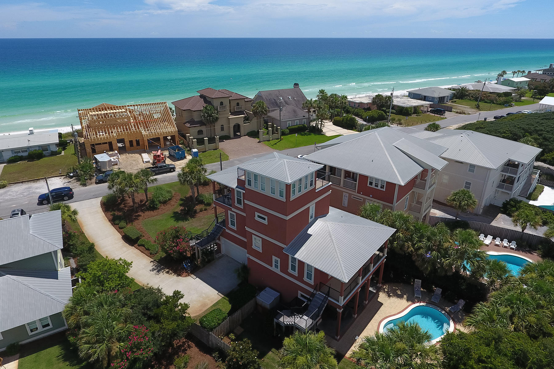 Gulf-view Champagne Jam lives up to it's name in every way​! ​Perfectly situated in uncrowded Blue Mountain Beach, this home is one back from the​ Gulf ​of Mexico, offers panoramic gulf views and affords enough space to host up to 12 guests. Strong rental history and no Homeowners Association fees make this a wise investment. The ground floor, by the pool consists of a large bedroom with King-sized bed, full hall bath, laundry room and two storage closets as well as direct access to the covered patio and​ ​pool deck.