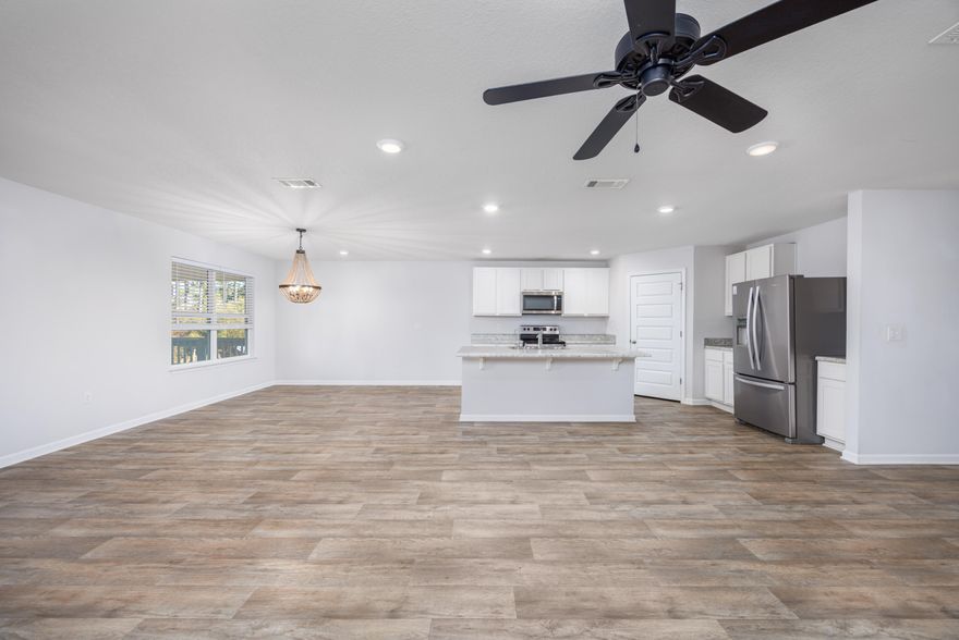 This charming home is ideally located to enjoy the best of coastal living. Situated in a desirable area, the property offers convenient access to beautiful white-sand beaches, shopping, dining, and everyday amenities, making it easy to enjoy the relaxed lifestyle the Emerald Coast is known for.Inside, the home features an inviting open floor plan that creates a bright and comfortable living space, perfect for both everyday living and entertaining. The large kitchen island serves as the heart of the home, offering ample space for cooking, gathering, and casual dining.Step outside to a screened-in back porch, an ideal spot to enjoy morning coffee or unwind in the evening while enjoying the outdoors in comfort. The home also includes a full-size two-car garage, providing generous storage and convenience.

With its close proximity to the beach and central location, this property is well suited for a primary residence, second home, or long-term rental, offering flexibility for a variety of lifestyles.

If you're looking for a home in a sought-after area with easy access to the coast and everything the surrounding community has to offer, this property presents a wonderful opportunity to make your move.